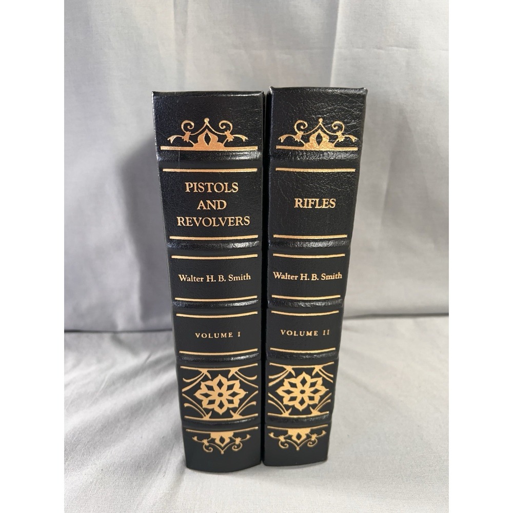 Pistols & Revolvers Vol I and Rifles Vol II Leather bound Books NRA